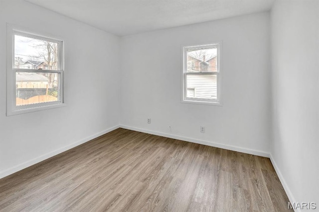 4931 Mardel Ave, Saint Louis, MO 63109 - spare room featuring light wood finished floors and baseboards