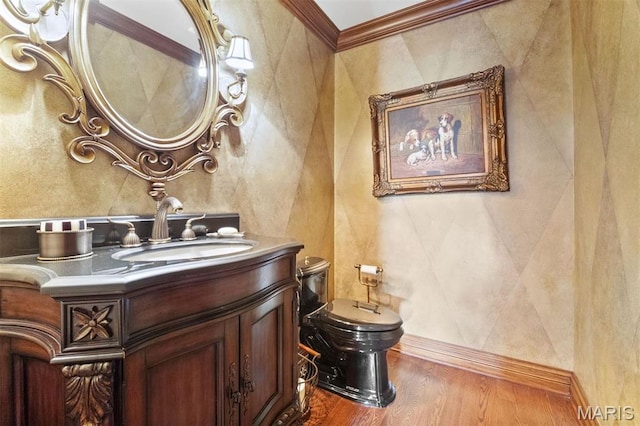 21 Log Cabin Dr, Saint Louis, MO 63124 - half bath with wood finished floors, vanity, toilet, and crown molding