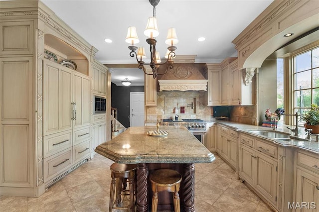 21 Log Cabin Dr, Saint Louis, MO 63124 - kitchen featuring cream cabinets, a sink, custom exhaust hood, a chandelier, and backsplash