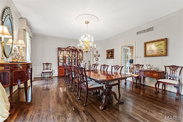 21 Log Cabin Dr, Saint Louis, MO 63124 - dining area with a chandelier, crown molding, dark wood-style flooring, and built in shelves