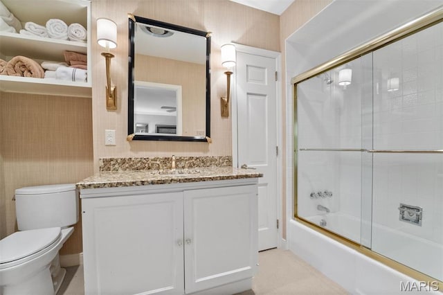 21 Log Cabin Dr, Saint Louis, MO 63124 - full bath featuring wallpapered walls, toilet, vanity, and bath / shower combo with glass door