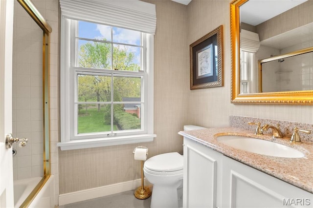 21 Log Cabin Dr, Saint Louis, MO 63124 - bathroom with baseboards, wallpapered walls, vanity, toilet, and shower / bath combination with glass door