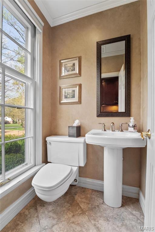 21 Log Cabin Dr, Saint Louis, MO 63124 - half bath with ornamental molding, baseboards, toilet, plenty of natural light, and a sink