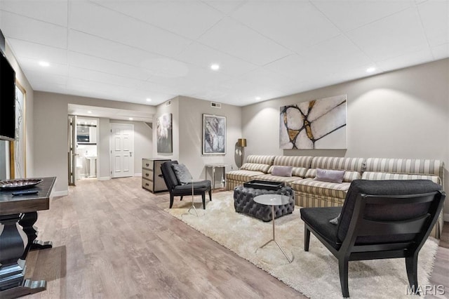 21 Log Cabin Dr, Saint Louis, MO 63124 - living area with a drop ceiling, wood finished floors, and recessed lighting