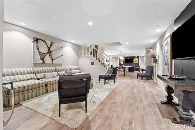 21 Log Cabin Dr, Saint Louis, MO 63124 - living area featuring wood finished floors and stairs