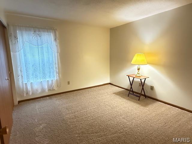 31 Berview Cir Unit H, Saint Louis, MO 63129 - unfurnished room with carpet flooring