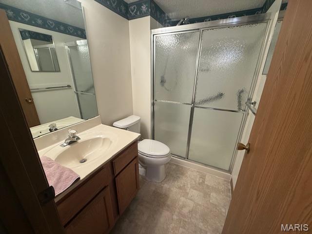 31 Berview Cir Unit H, Saint Louis, MO 63129 - bathroom with a shower stall and vanity