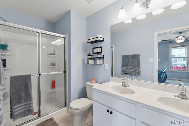 104 Tiber Way, Saint Charles, MO 63301 - bathroom featuring a stall shower, double vanity, tile patterned flooring, and toilet