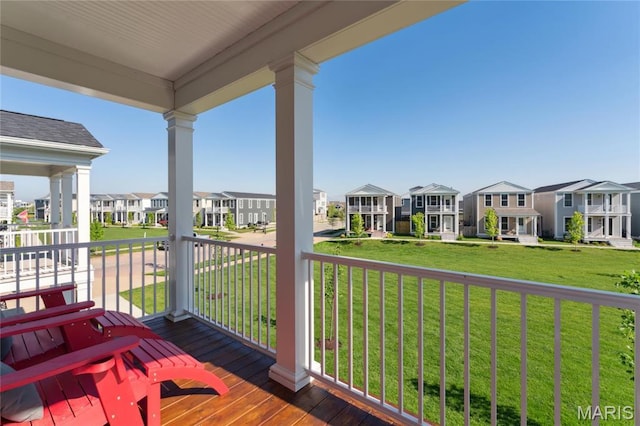 104 Tiber Way, Saint Charles, MO 63301 - wooden porch featuring a residential view and a yard