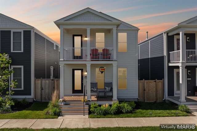 104 Tiber Way, Saint Charles, MO 63301 - view of front of house with a balcony, covered porch, and a gate