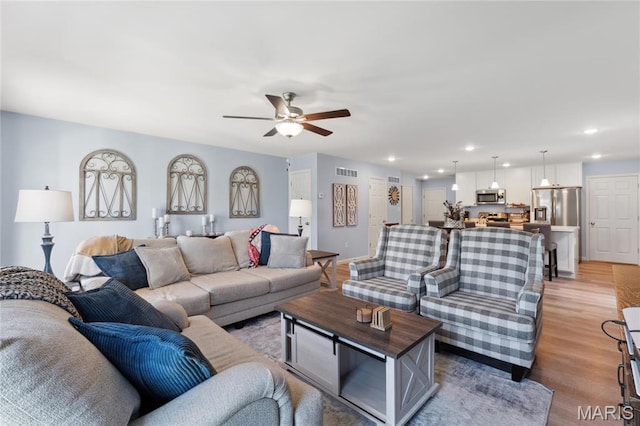 104 Tiber Way, Saint Charles, MO 63301 - living area with ceiling fan, light wood-style flooring, and recessed lighting