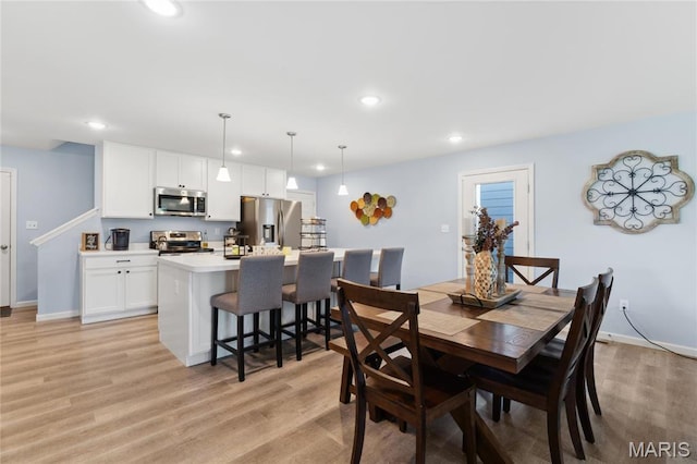 104 Tiber Way, Saint Charles, MO 63301 - dining space with recessed lighting, light wood finished floors, and baseboards