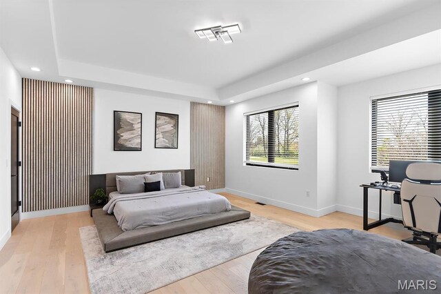 10010 Schuessler Rd, Saint Louis, MO 63128 - bedroom featuring recessed lighting, baseboards, light wood-style floors, and an office area