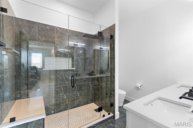 10010 Schuessler Rd, Saint Louis, MO 63128 - bathroom featuring marble tiled flooring, a sink, toilet, and a marble finish shower