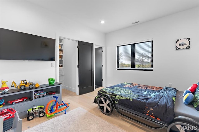 10010 Schuessler Rd, Saint Louis, MO 63128 - bedroom featuring light wood-type flooring and recessed lighting