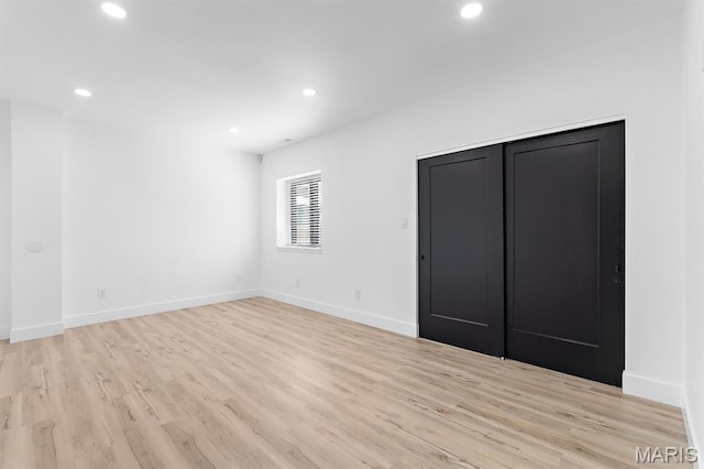 10010 Schuessler Rd, Saint Louis, MO 63128 - unfurnished room featuring light wood finished floors, recessed lighting, and baseboards