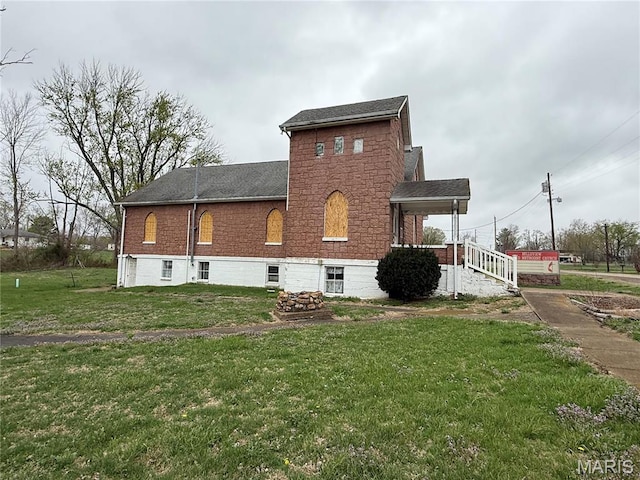 5920 County Rd 20, Belleview, MO 63623 - view of home's exterior featuring a lawn and roof with shingles