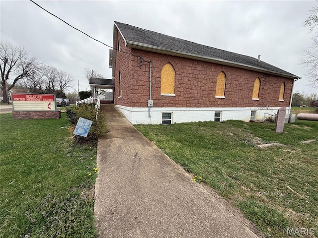 5920 County Rd 20, Belleview, MO 63623 - view of home's exterior featuring a lawn and roof with shingles