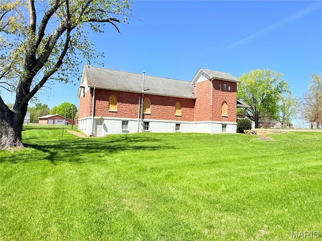 5920 County Rd 20, Belleview, MO 63623 - rear view of property featuring a yard, roof with shingles, and brick siding