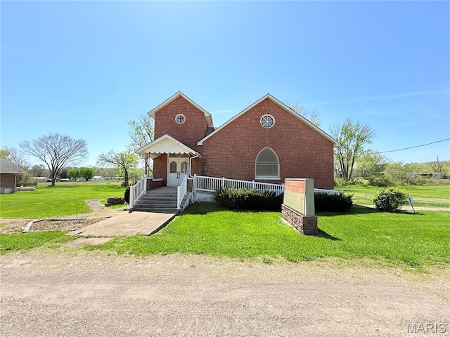 5920 County Rd 20, Belleview, MO 63623 - view of front of house with a front lawn and a porch