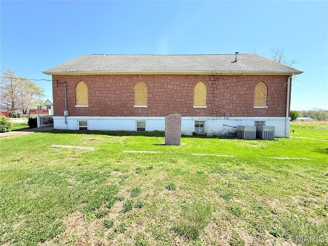 5920 County Rd 20, Belleview, MO 63623 - view of home's exterior featuring a lawn and central air condition unit