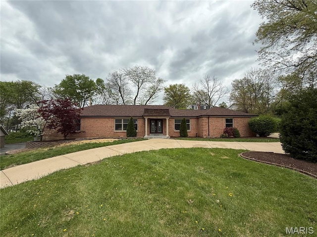 362 Hibler Ct, Saint Louis, MO 63141 - ranch-style house with brick siding, a front yard, and french doors