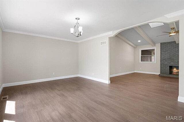 362 Hibler Ct, Saint Louis, MO 63141 - unfurnished living room with arched walkways, a ceiling fan, baseboards, dark wood-type flooring, and a chandelier