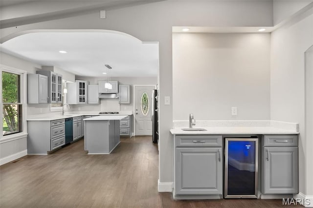 362 Hibler Ct, Saint Louis, MO 63141 - kitchen featuring gray cabinetry, beverage cooler, under cabinet range hood, and recessed lighting