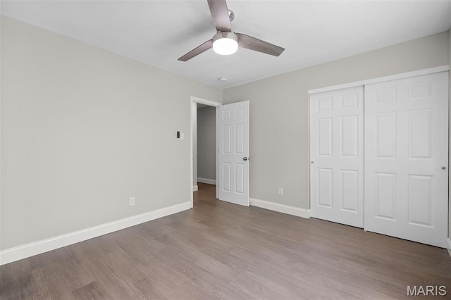 362 Hibler Ct, Saint Louis, MO 63141 - unfurnished bedroom with wood finished floors, baseboards, a closet, and ceiling fan
