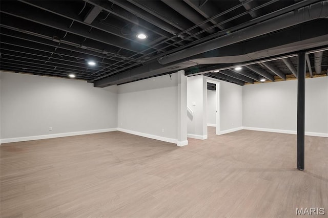 362 Hibler Ct, Saint Louis, MO 63141 - finished below grade area with wood finished floors and baseboards