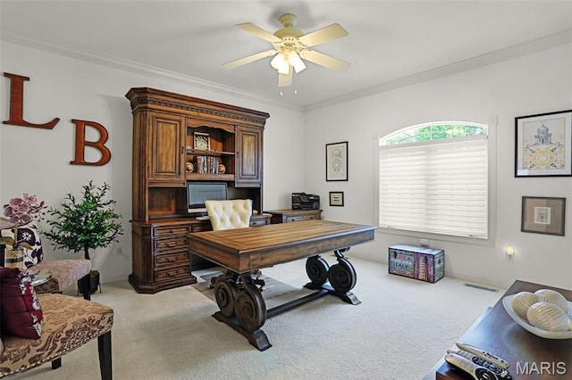 office area with light colored carpet, ceiling fan, and crown molding