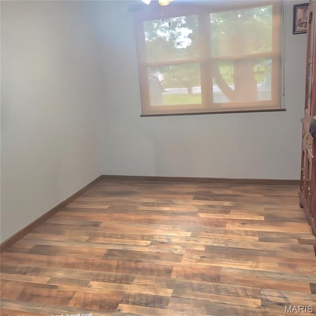 2 Hyannis Ct, Saint Charles, MO 63301 - spare room featuring wood finished floors