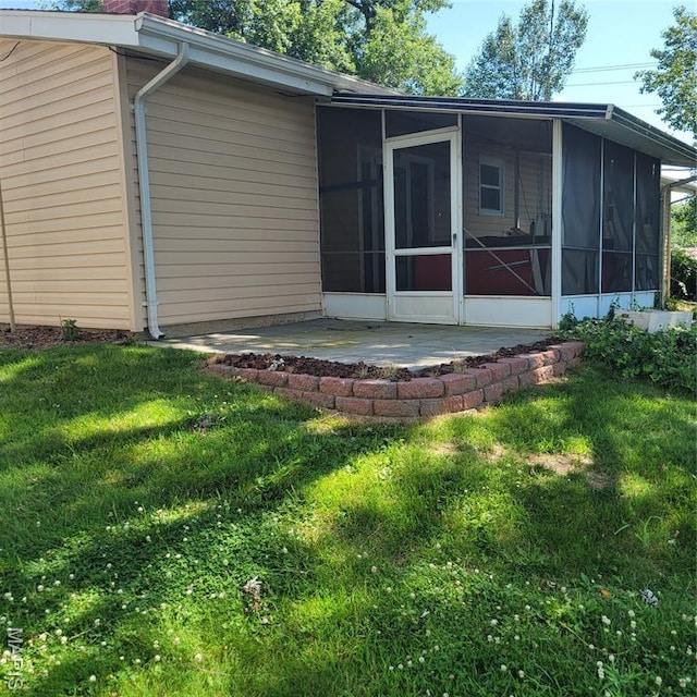 2 Hyannis Ct, Saint Charles, MO 63301 - view of side of home with a sunroom and a yard