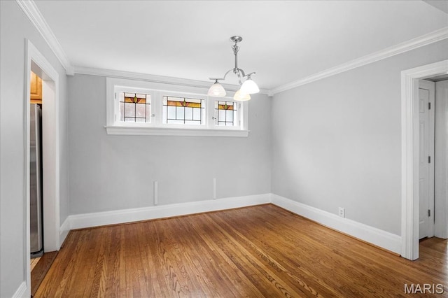 7570 Byron Pl Unit 3W, Saint Louis, MO 63105 - unfurnished dining area with baseboards, wood finished floors, crown molding, and a chandelier