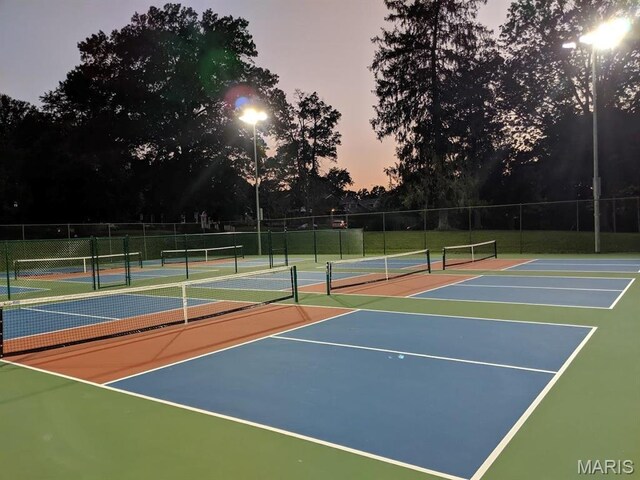 5872 Sunshine Dr Unit 110, Saint Louis, MO 63109 - view of tennis court with community basketball court and fence