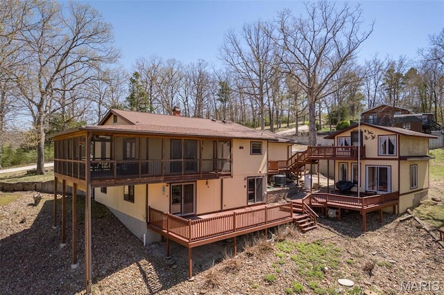 13145 Wanda Lee Ln, Saint Genevieve, MO 63670 - rear view of house featuring a deck, a sunroom, and a balcony