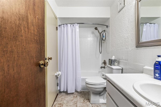 13145 Wanda Lee Ln, Saint Genevieve, MO 63670 - full bath featuring vanity, toilet, shower / tub combo, and a textured wall