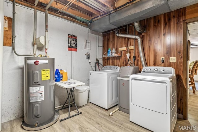 13145 Wanda Lee Ln, Saint Genevieve, MO 63670 - laundry area with water heater, separate washer and dryer, and wood finished floors