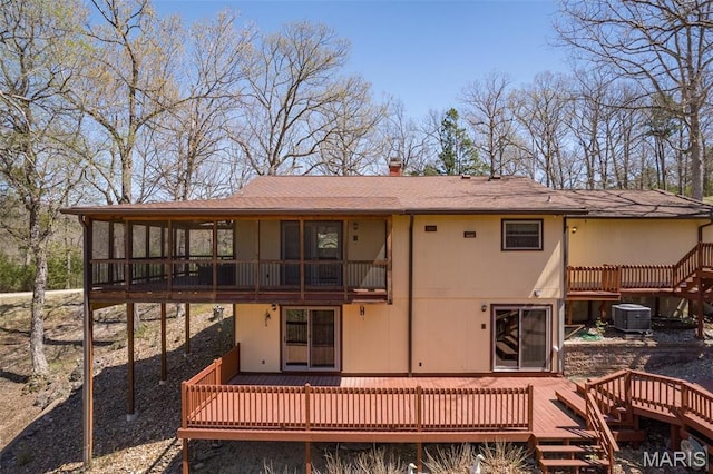 13145 Wanda Lee Ln, Saint Genevieve, MO 63670 - rear view of house featuring central air condition unit, a balcony, and a wooden deck