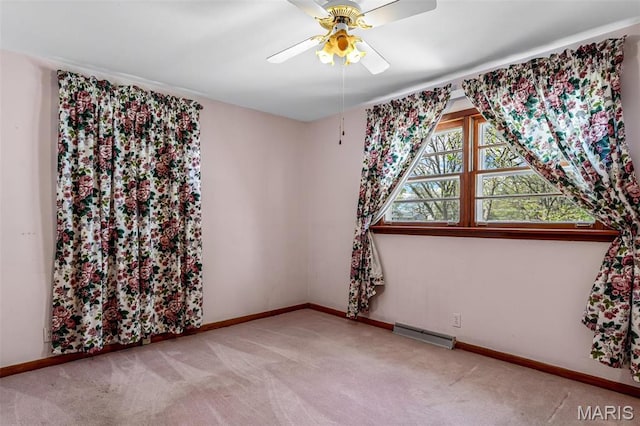 8907 Spur Ln, Saint Louis, MO 63121 - carpeted empty room featuring a ceiling fan and baseboards