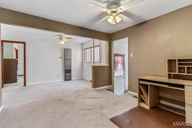 8907 Spur Ln, Saint Louis, MO 63121 - carpeted empty room with a ceiling fan and baseboards