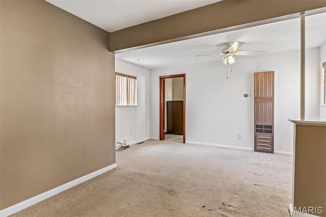 8907 Spur Ln, Saint Louis, MO 63121 - spare room featuring carpet, ceiling fan, and baseboards