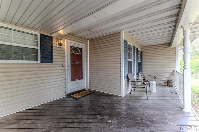 20373 Heritage Rd, Saint Robert, MO 65584 - wooden terrace with covered porch
