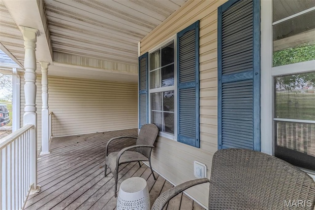 20373 Heritage Rd, Saint Robert, MO 65584 - wooden deck with a porch