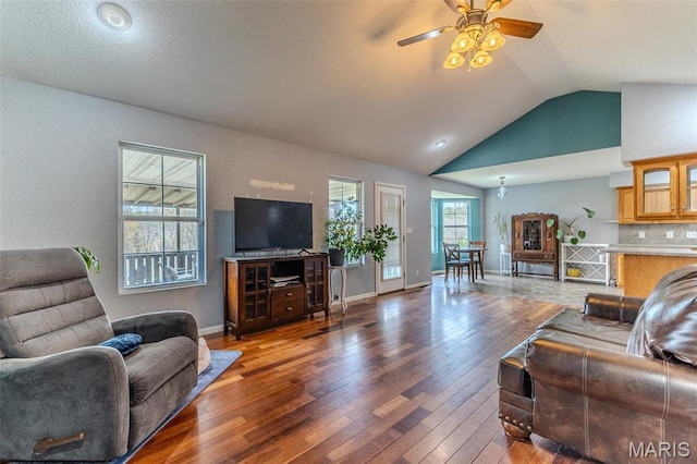 20373 Heritage Rd, Saint Robert, MO 65584 - living room with vaulted ceiling, a ceiling fan, hardwood / wood-style floors, and baseboards