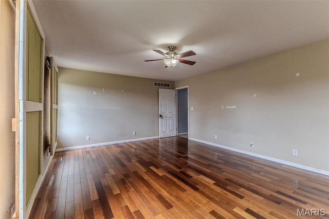 20373 Heritage Rd, Saint Robert, MO 65584 - spare room featuring a ceiling fan, hardwood / wood-style flooring, and baseboards