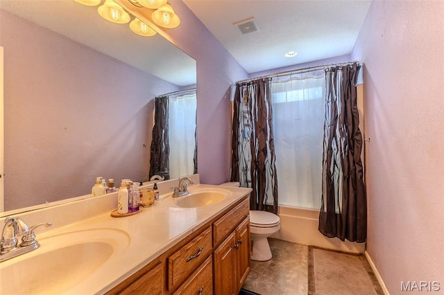 20373 Heritage Rd, Saint Robert, MO 65584 - full bathroom with toilet, double vanity, tile patterned flooring, and shower / bath combo