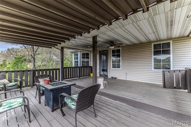 20373 Heritage Rd, Saint Robert, MO 65584 - deck featuring an outdoor fire pit and a ceiling fan