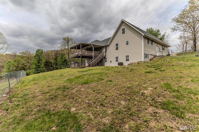 20373 Heritage Rd, Saint Robert, MO 65584 - rear view of house featuring stairway and a wooden deck