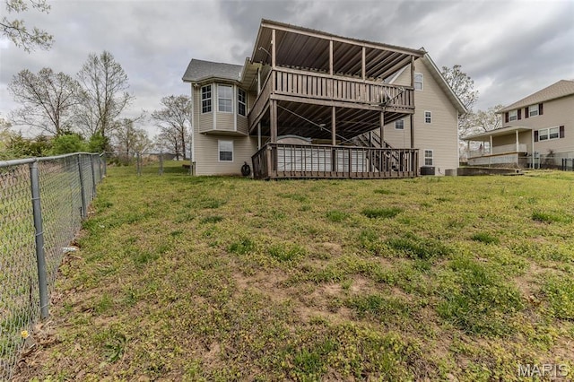 20373 Heritage Rd, Saint Robert, MO 65584 - rear view of property featuring a wooden deck
